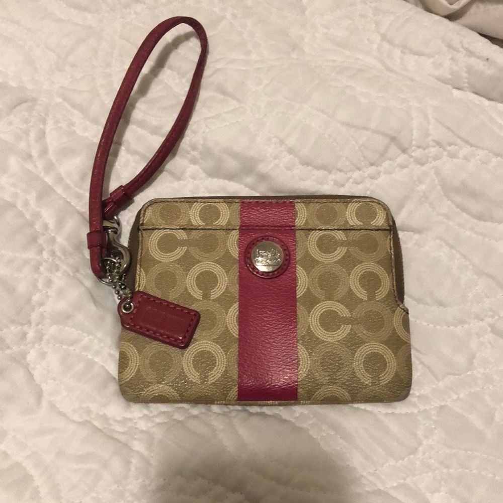 Coach tan and pink wristlet clutch